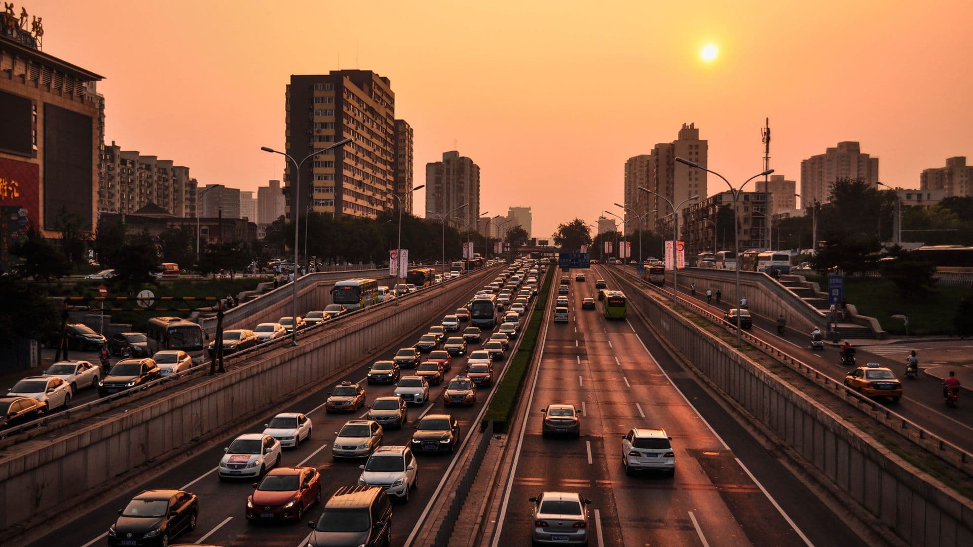 Evening city traffic at sunset